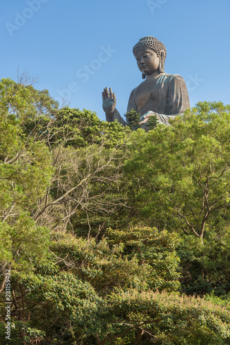 Tian Tan Buddha, aka the Big Buddha, is a large bronze statue of Sakyamuni Buddha and located at Ngong Ping, Lantau Island in Hong Kong photo