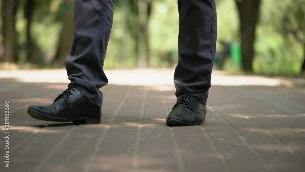 Blind man trying to find way with white cane, orientation problems, navigation Blind man trying to find way with white cane, orientation problems, navigation