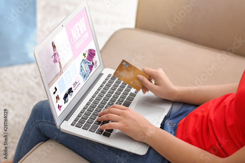 Young woman shopping online...