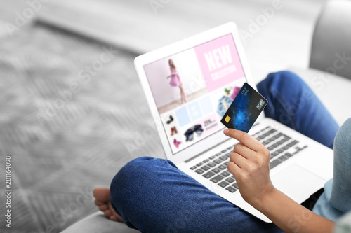 Young woman shopping online...
