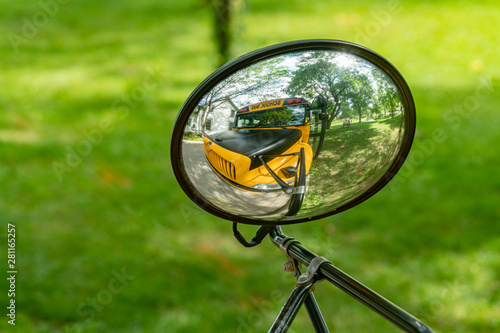 School bus reflection in a convex mirror