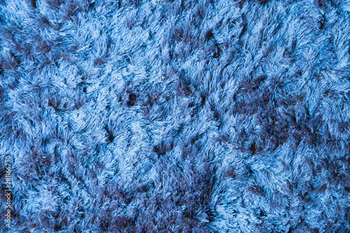 фотографія Blue fabric carpet with long pile texture