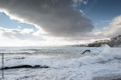 breaking waves on a stony beach