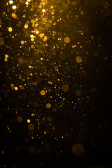 Abstract gold bokeh with black