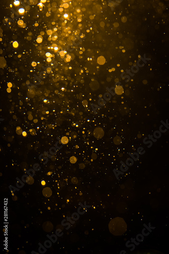 Abstract gold bokeh with black