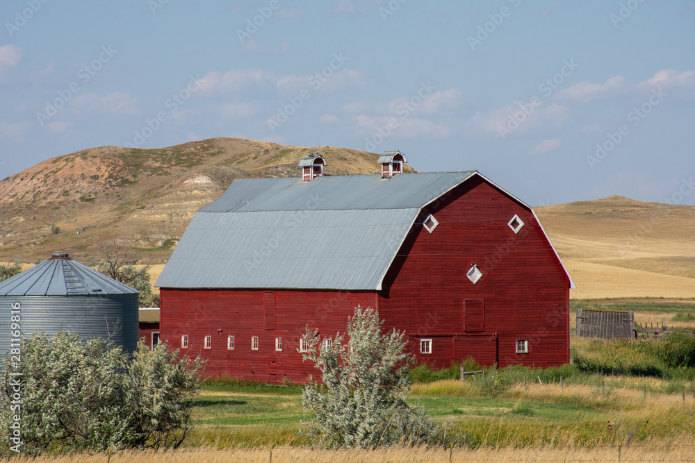 old red barn and silo in Montana old red barn and silo in Montana