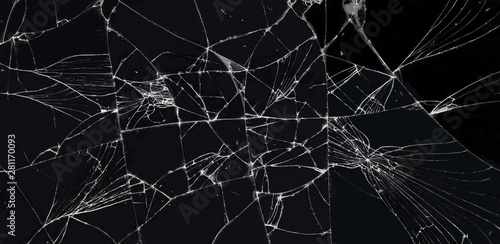 broken glass dark background texture, Cracked touch screen phone. photo