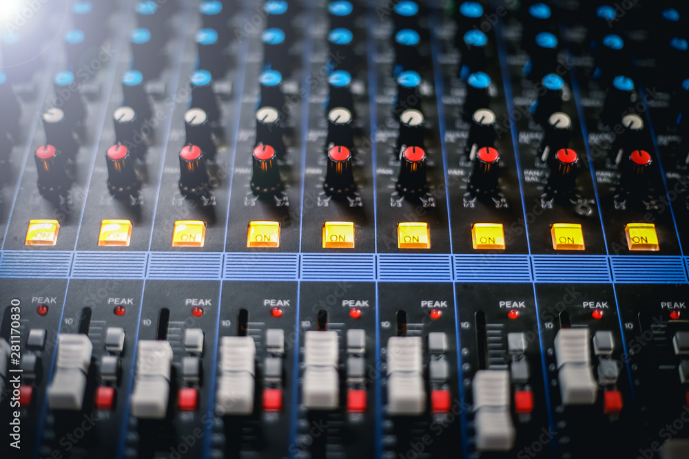 Professional mixing console in studio. Used for audio signals modifications to achieve the desired output. 