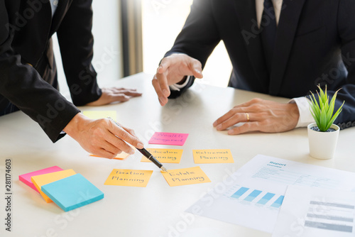 wealth management concept, business man and team analyzing financial statement for planning financial customer case in office. photo