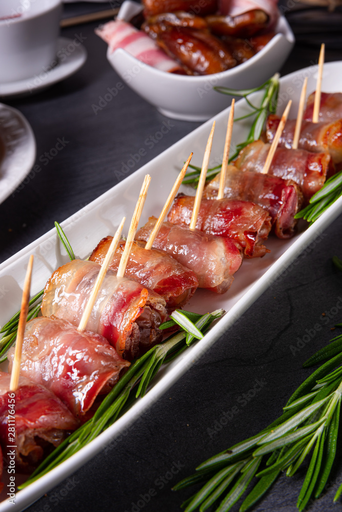  dates wrapped in bacon and delicious tapas