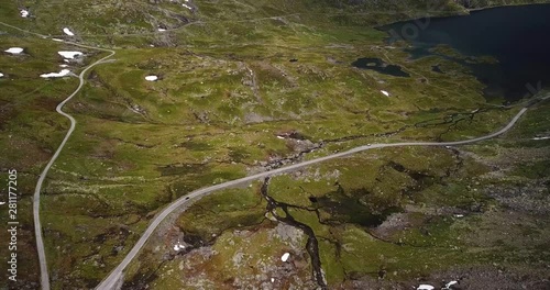 Aerial view of a car driving on a mountain road in the Haukelifjell area in Norway photo