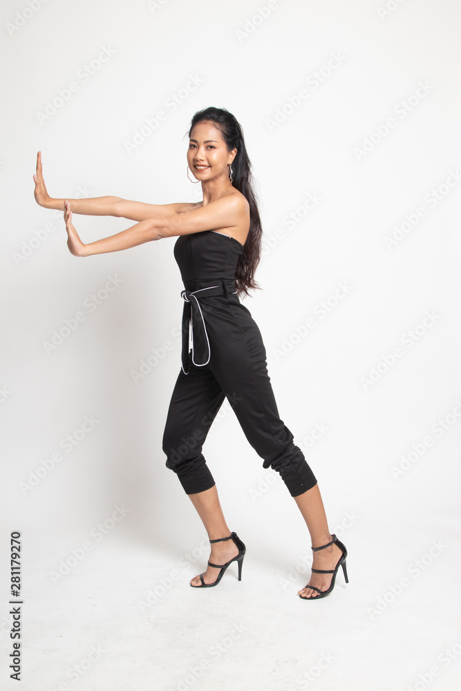 Full body of beautiful young asian woman push something. Full body of beautiful young asian woman push something.