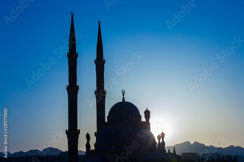 Silhouette Al-Sahaba Mosque at sunset time in Sharm el Sheikh, Egypt. Architecture of Al Sahaba, Al Mustafa, mosque in center of old town photo