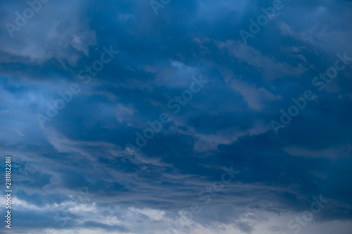 Light in the Dark and Dramatic Storm Clouds background © max_play