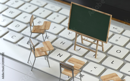 Blackboard and chairs on the keyboard of a latop, 3d rendering,conceptual image. e-training and e-learning concepts.