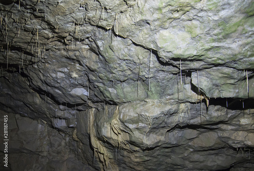 Interior of an underground cave with stalactites © Paul Vinten