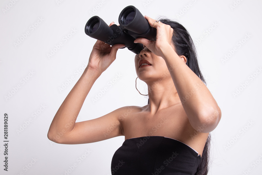 Young Asian woman with binoculars. Young Asian woman with binoculars.