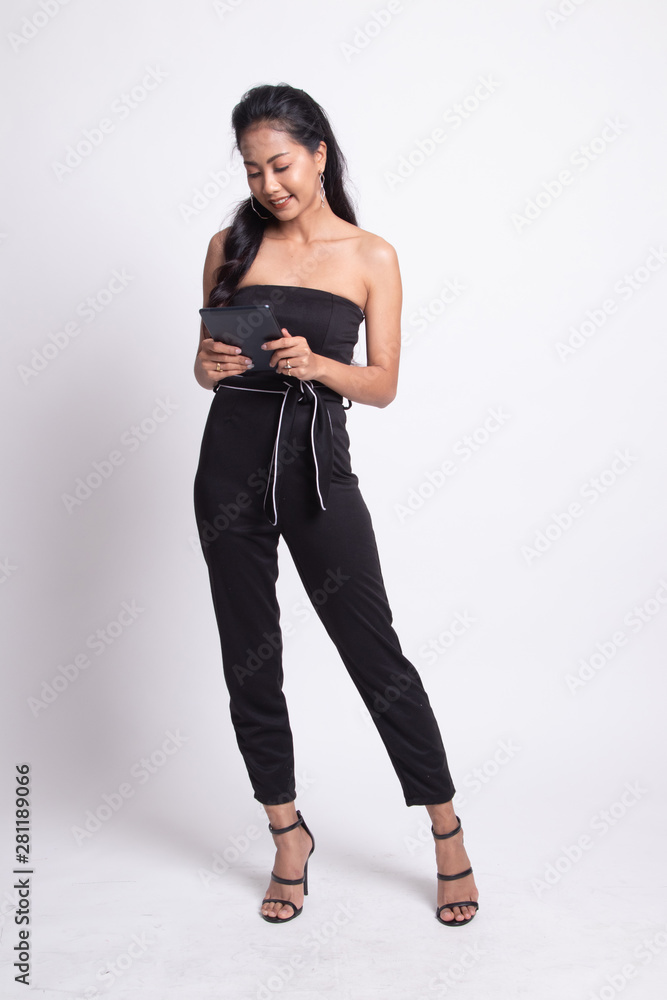 Young Asian woman with a computer tablet. Young Asian woman with a computer tablet.