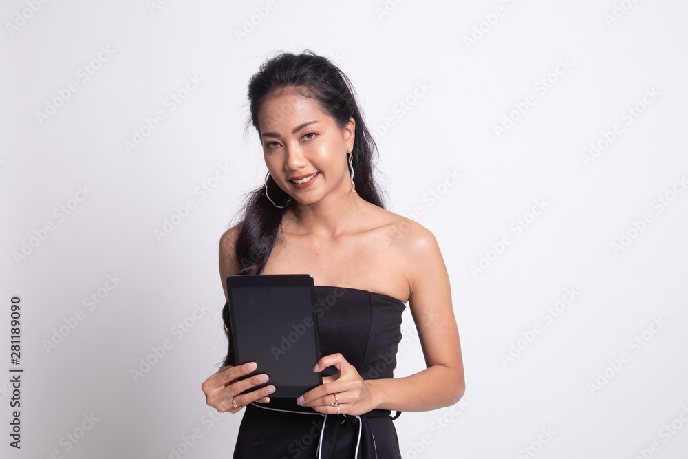 Young Asian woman with a computer tablet. Young Asian woman with a computer tablet.
