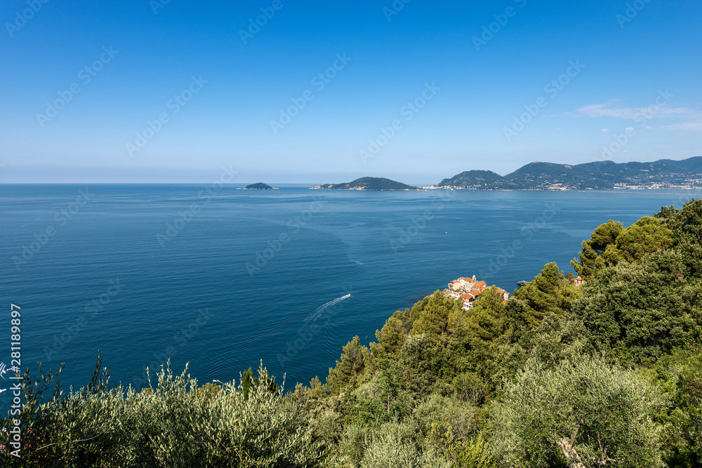 Gulf of La Spezia and Mediterranean sea, with the ancient and small village of Tellaro. In the background the islands of Palmaria, Tino and Tinetto an the Portovenere Town. Liguria, Italy, Europe