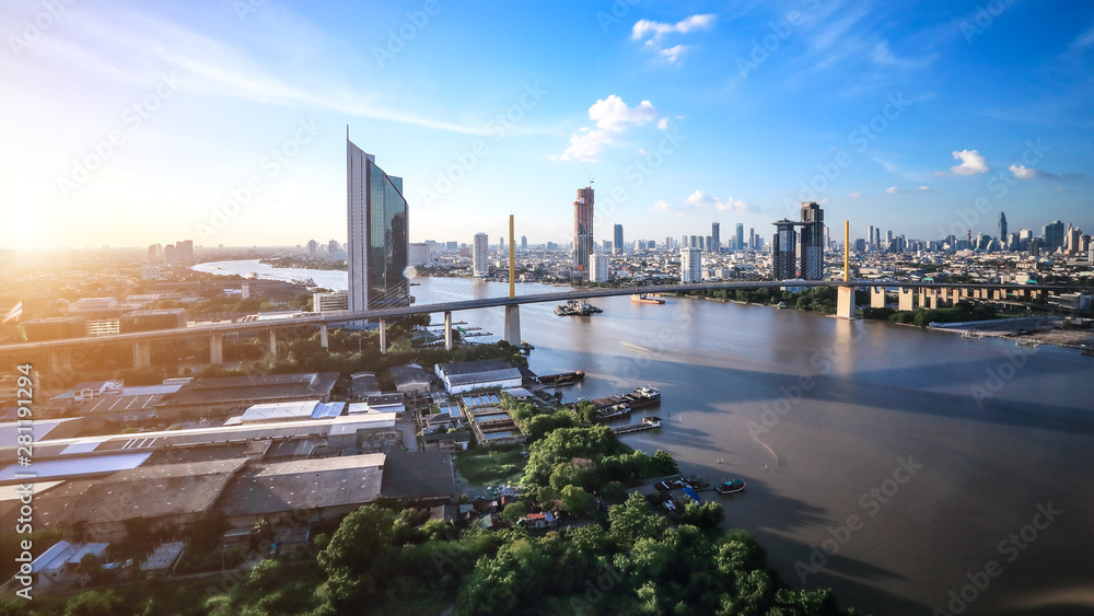 Panorama view of Bangkok city with Business building and Chao Phraya River .