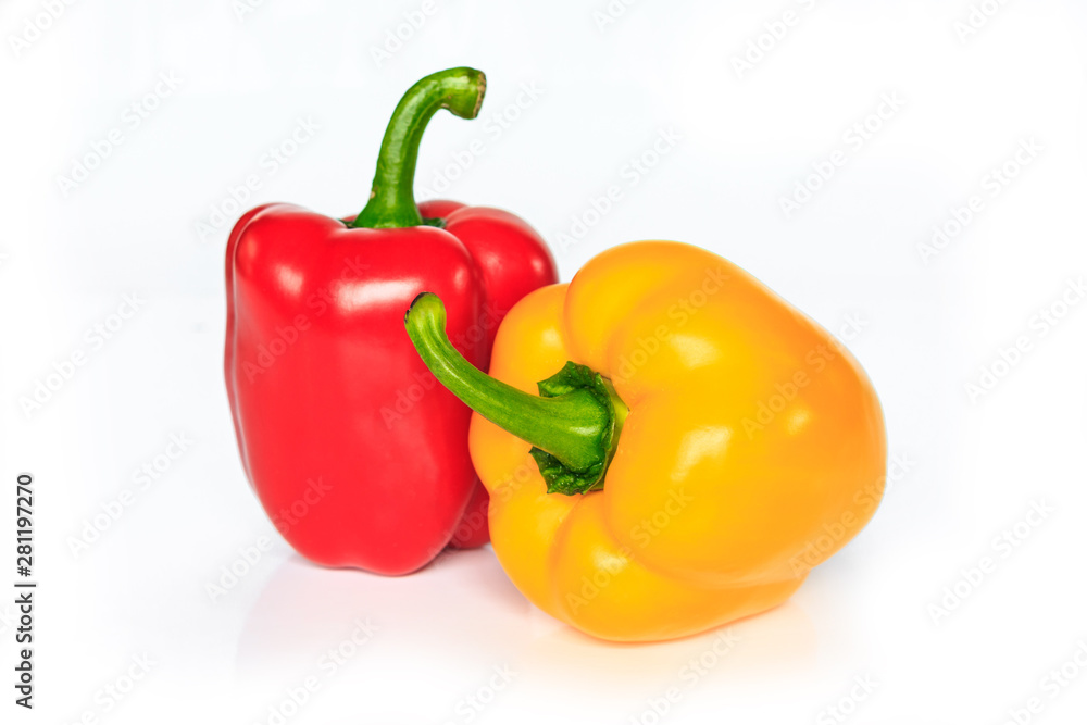 red and yellow bell pepper on white background. red and yellow bell pepper on white background.