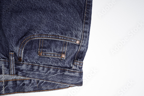 Classic blue jeans front pockets. rough denim texture. jeans on a pure white background. free space for text