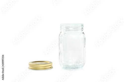 Empty jar of golden cap is open on a white background.