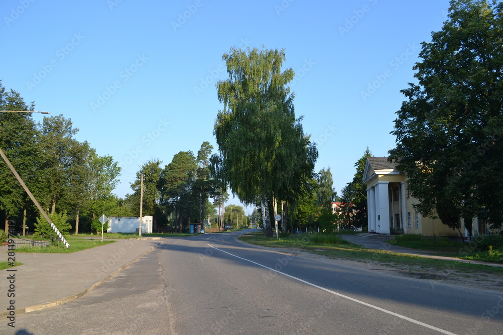 Asphalt road in the morning rays, in the countryside. Asphalt road in the morning rays, in the countryside.