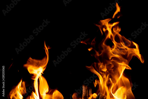strong fire flames on black isolated background