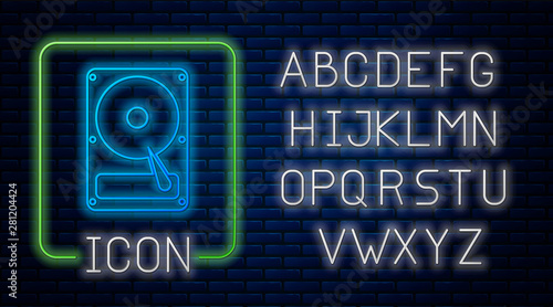 Glowing neon Hard disk drive HDD icon isolated on brick wall background. Neon light alphabet. Vector Illustration