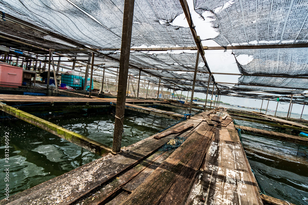 Fish farm of fishing nets equipments during day