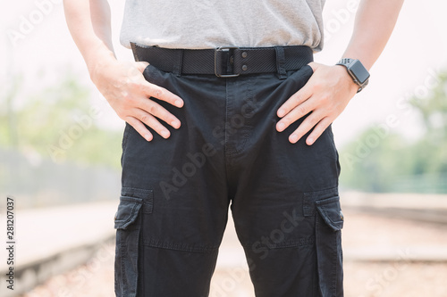 Model wearing black cargo pants or cargo trousers