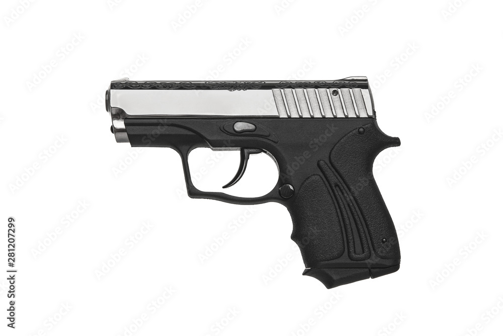 A small silver-black pistol with a pattern on the body. Gift weapon isolate on white background. A small silver-black pistol with a pattern on the body. Gift weapon isolate on white background.