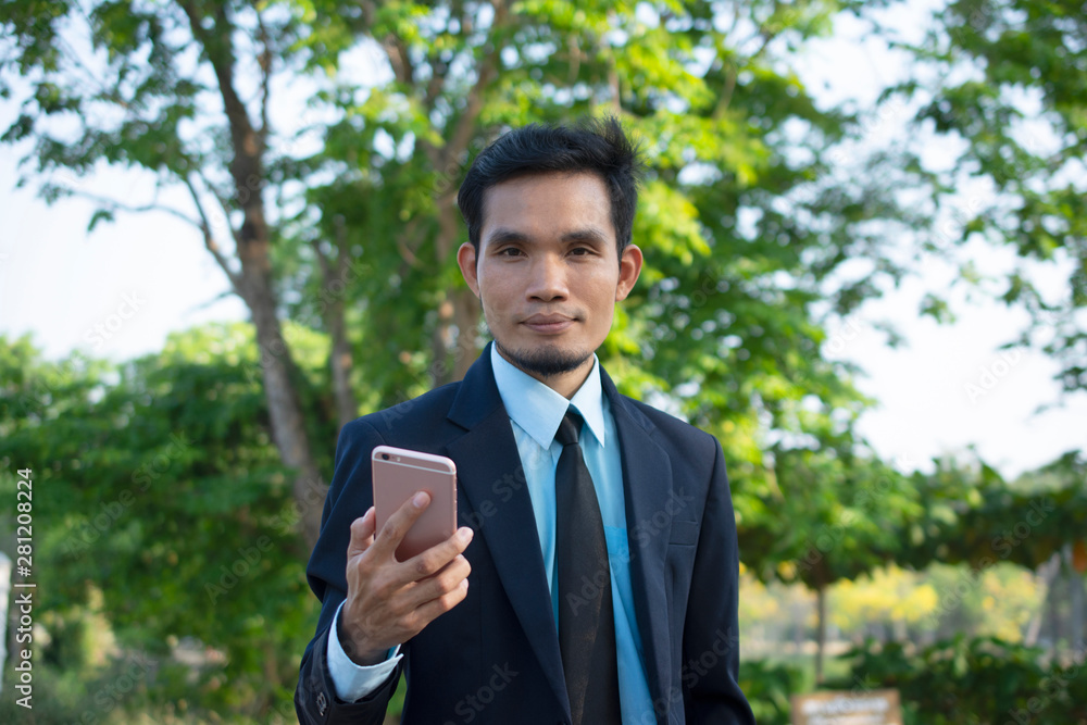 Businessman People holding Mobile Smart Phone and Talking phone Businessman People holding Mobile Smart Phone and Talking phone