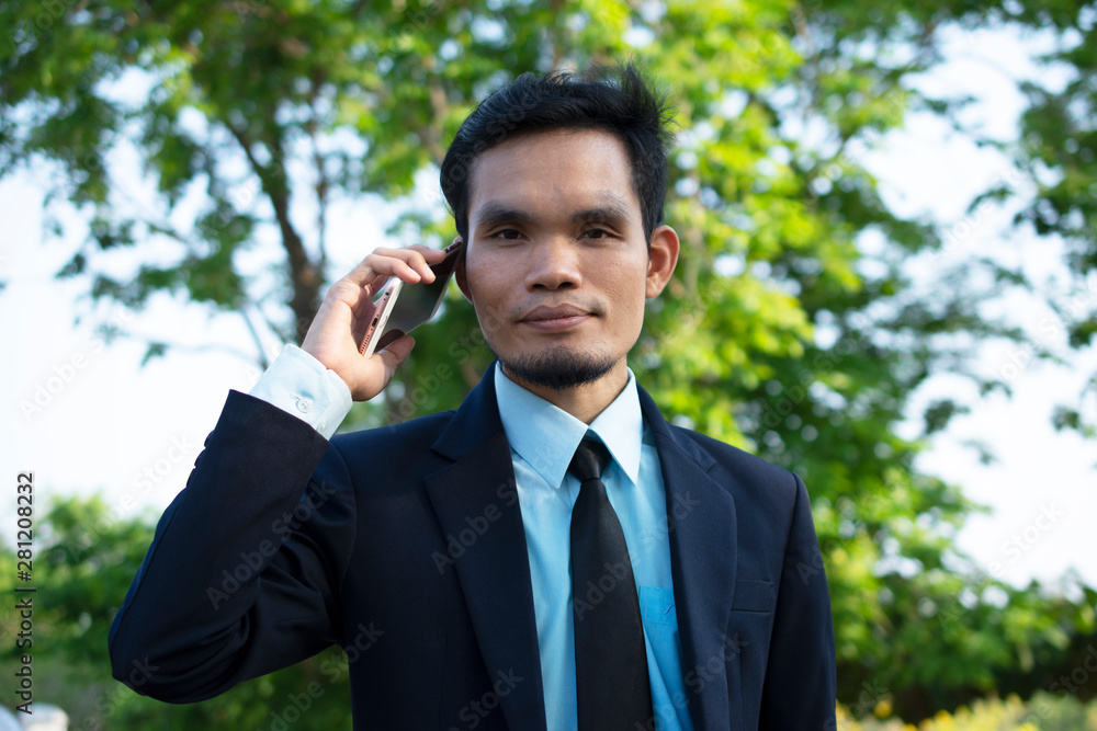 Businessman People holding Mobile Smart Phone and Talking phone Businessman People holding Mobile Smart Phone and Talking phone