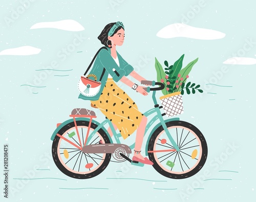 Happy girl dressed in trendy clothes riding city bicycle with flower bouquet in front basket. Adorable young hipster woman on bike. Cute pedaling female bicyclist. Flat cartoon vector illustration.