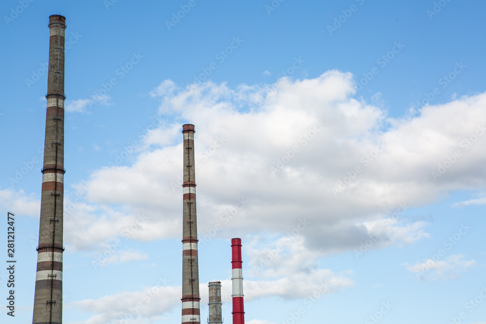 factory chimneys on background of blue sky factory chimneys on background of blue sky