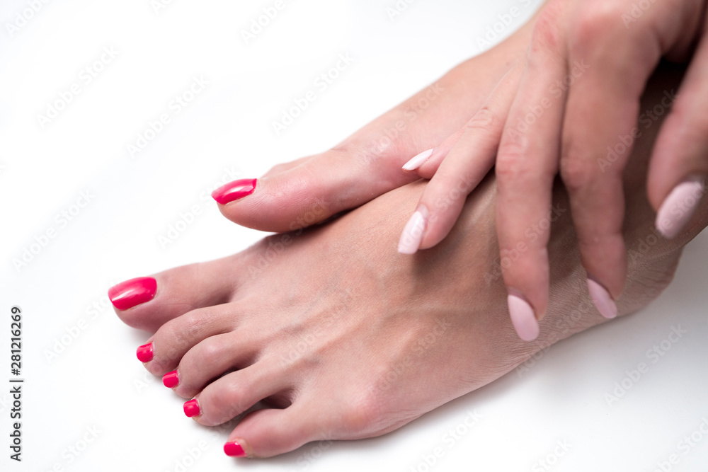Beautiful woman's feets with a red nails. Beautiful woman's feets with a red nails.