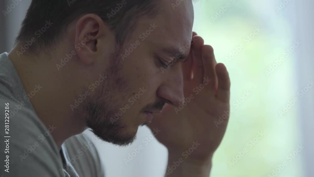 Portrait of stressed caucasian man at home. Problems in the relationships. Betrayal, mistrust, breakup concept. The man in depression. Restless man having problems in personal life suffers break up. Portrait of stressed caucasian man at home. Problems in the relationships. Betrayal, mistrust, breakup concept. The man in depression. Restless man having problems in personal life suffers break up.