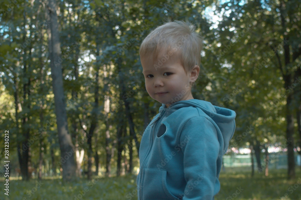 Portrait of nice child in the park Portrait of nice child in the park