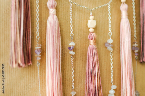 Wallpaper Mural Closeup modern mandala with quartz crystals, amethyst, moonstone, tassels and chain on craft paper background Torontodigital.ca