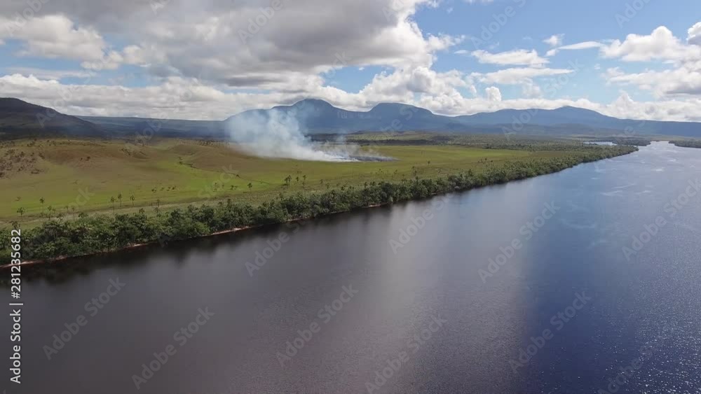 A fire in the distance, Canaima National Park, Venezuela A fire in the distance, Canaima National Park, Venezuela
