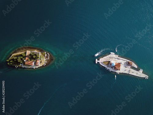 Aerial photo of St. George and monastery on the islands near Perast town in Kotor bay