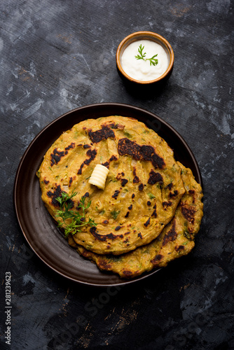 Thalipeeth is a type of savoury multi-grain pancake popular in Maharashtra, India served with curd/butter or ghee