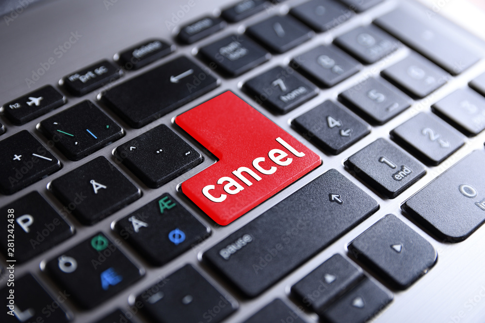 Close-up view on conceptual notebook keyboard - cancel (red key,button) Close-up view on conceptual notebook keyboard - cancel (red key,button)