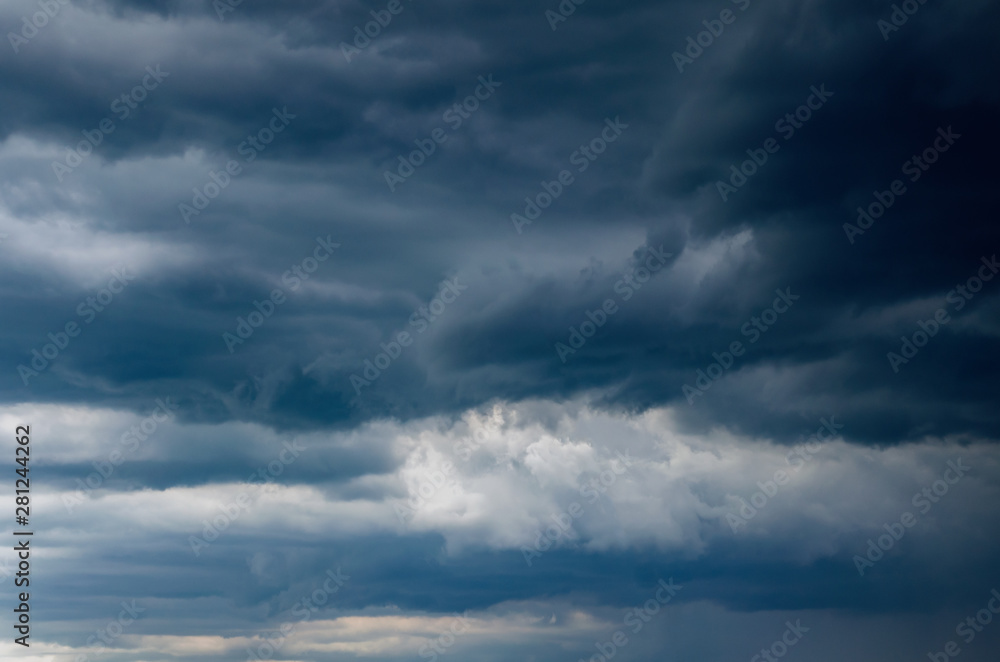 Dark storm clouds in the sky, background Dark storm clouds in the sky, background