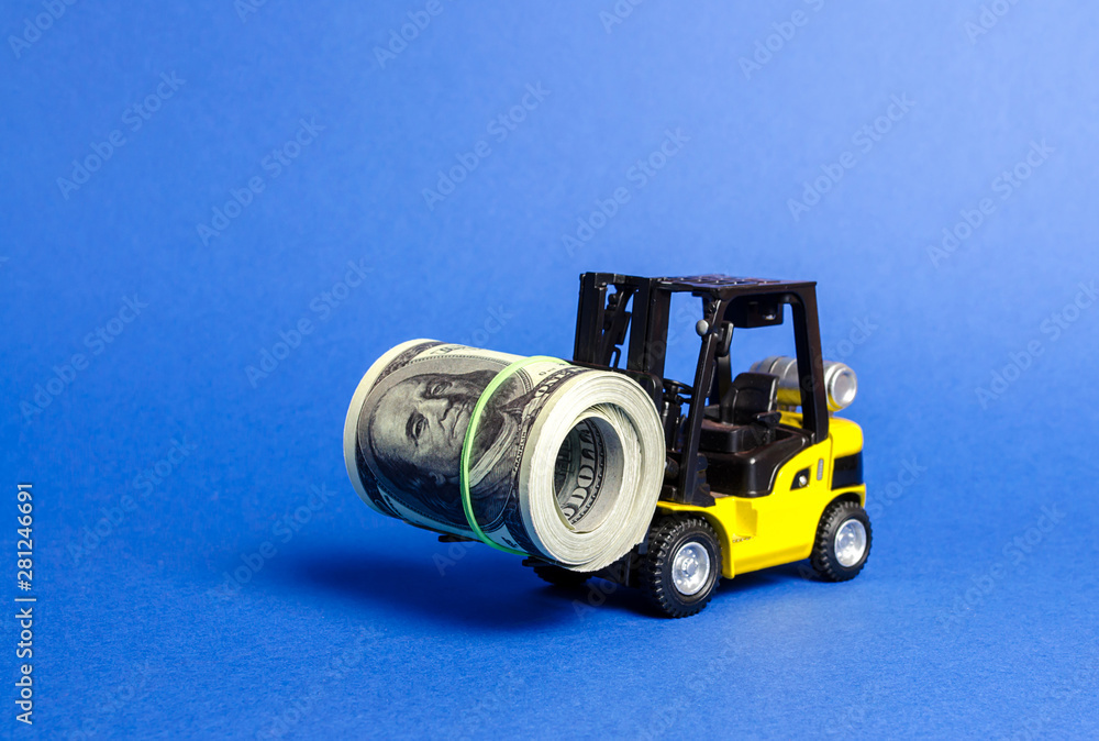 Forklift truck carries a bundle of dollars. Export of capital, offshore economic zones. Attracting direct investment in business and production, improving economic performance. capitalism. Forklift truck carries a bundle of dollars. Export of capital, offshore economic zones. Attracting direct investment in business and production, improving economic performance. capitalism.