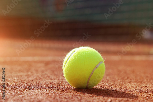 Tennis court with ball and net, close-up
