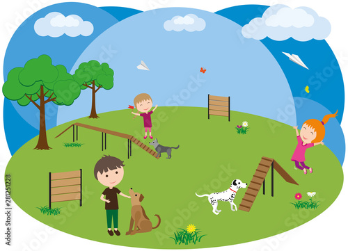 Dog playground. Children walk their dogs. Fun children play and jump in the park along with your pets.